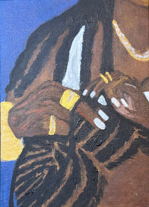 close up on someone getting their hair braided 